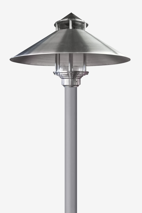 A silver lamp is sitting on top of a pole.