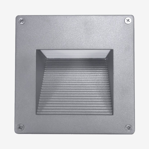 A square light with a metal frame and a white background