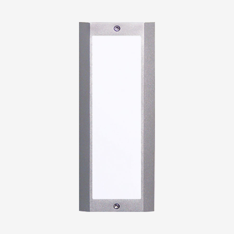 A rectangular light with a metal frame and glass.