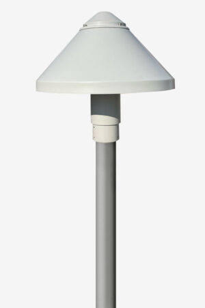 A white lamp sitting on top of a metal pole.